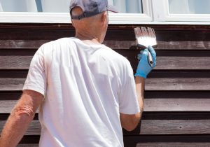 Residential Painter Using Brush During Best Time Of Year To Paint